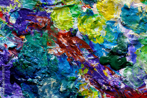 Artist palette with colorful paint spots