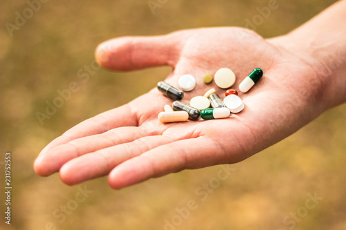 Various drugs in human hand 