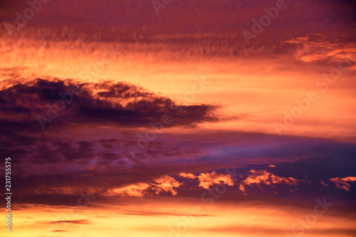 romantic sunset sky with golden clouds © TTLmedia