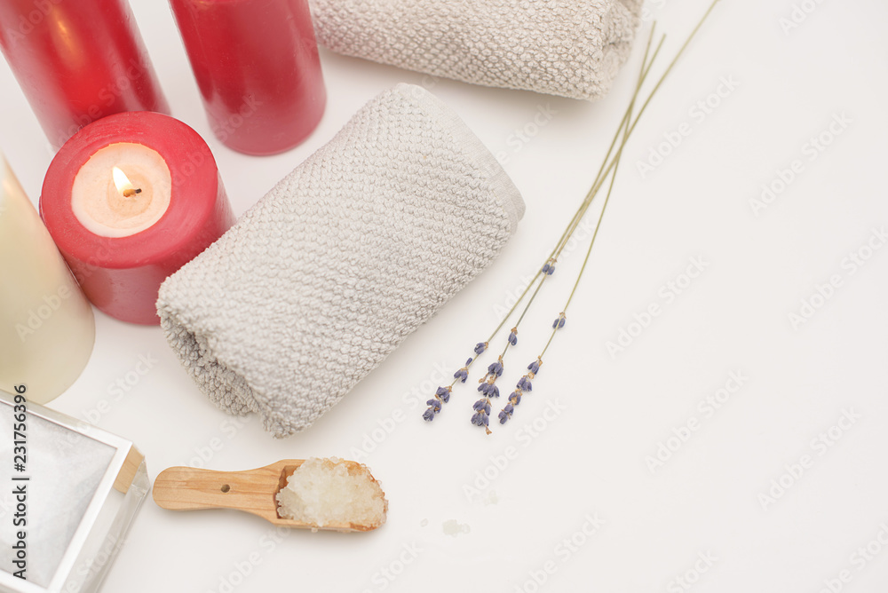 Obraz premium Spa care - candles, cream, towel. Flat lay, spa concept. 