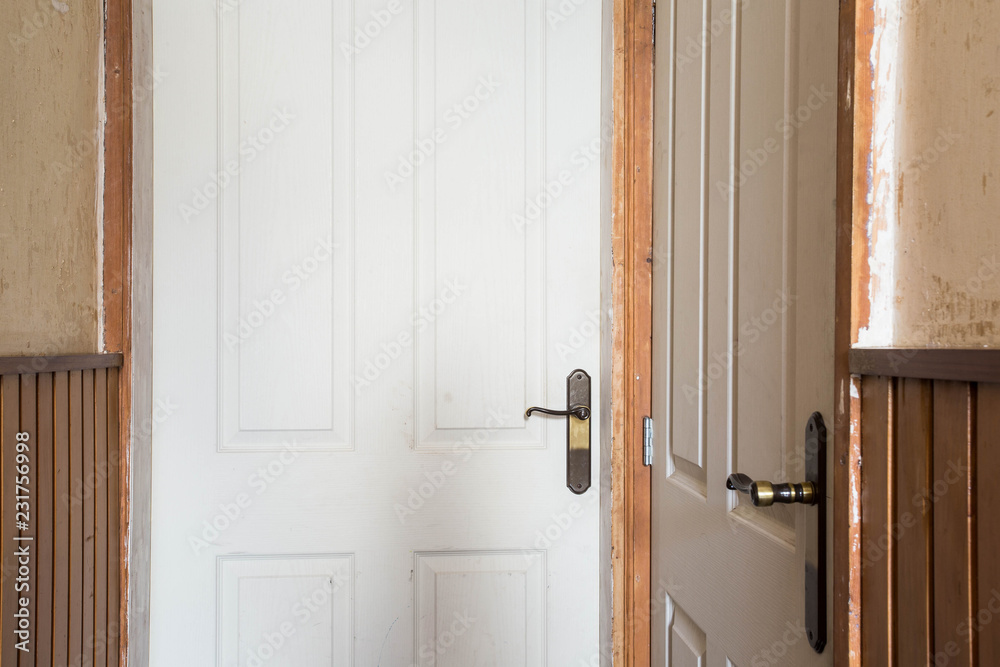 Close up of a old wooden door, renovate hallway vintage Close up of a old wooden door, renovate hallway vintage