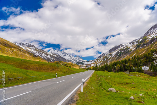 Road amoung snowy Alps mountains, Fluelapass, Davos,  Graubuende