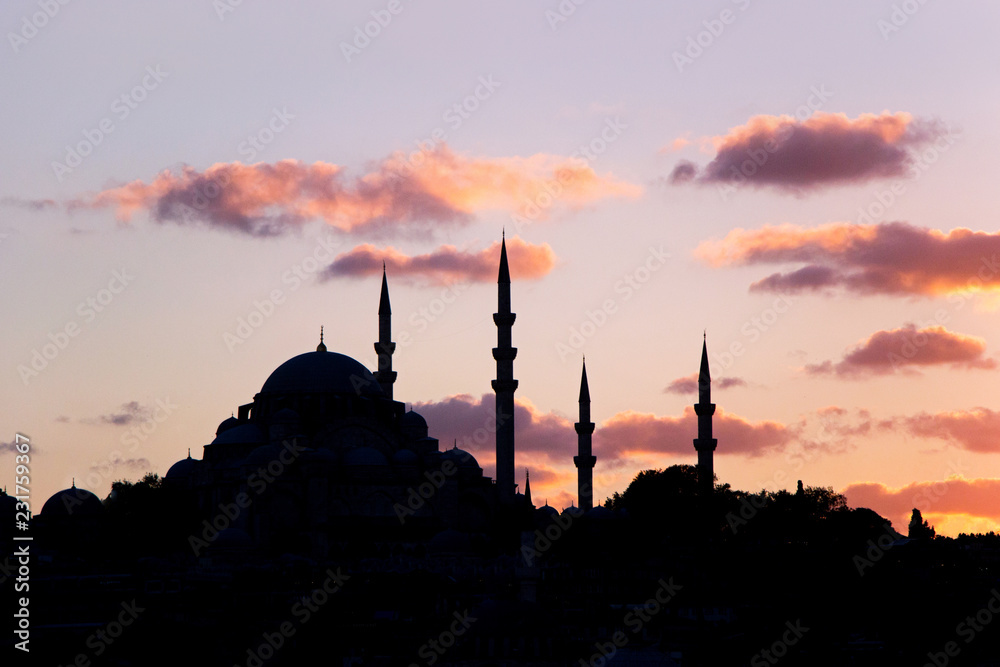 Mosque with red sky at sunset in Istanbul	