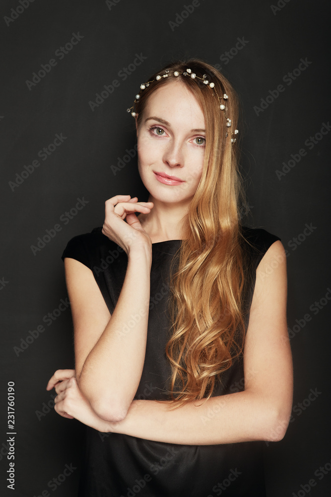 Beautiful young woman portrait on black background Beautiful young woman portrait on black background