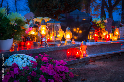 Colorful candles on the cemetery at All Saints Day  Poland