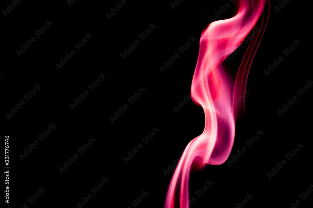 Red smoke on black background Red smoke on black background
