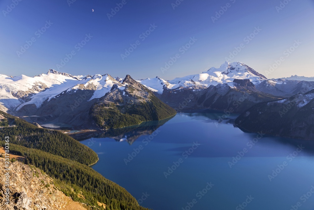 Scenic Landscape View of Blue Garibaldi Lake and Snow Covered Coast Mountains from Panorama Ridge in Sea to Sky Corridor between Squamish and Whistler, British Columbia Canada