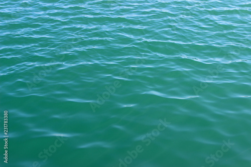 Blue green sea water surface texture ripples background