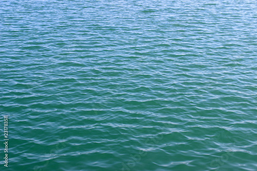 Blue green sea water surface texture ripples background