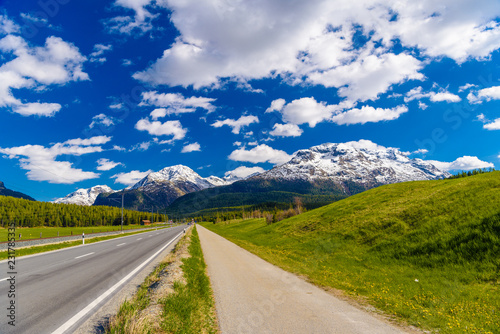 Road with Alps mountains, Samedan, Maloja, Graubuenden, Switzerl