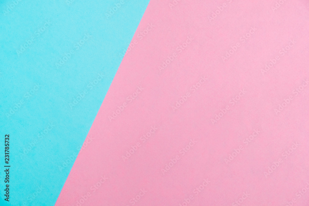 Pastel colored paper flat lay top view, background texture, pink and blue.