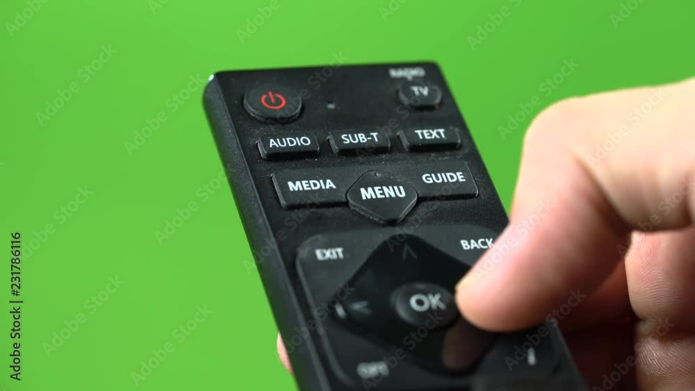 TV Remote on green screen . Close up