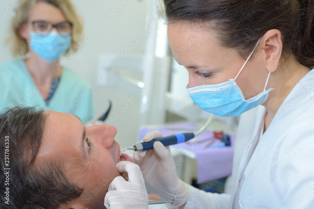 man in the dentist clinic man in the dentist clinic