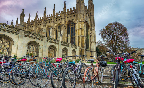 Cambridge, UK; October 2018; Bicycles on the foreground and Kings Collage, Cambridge, UK on the background at sunset.