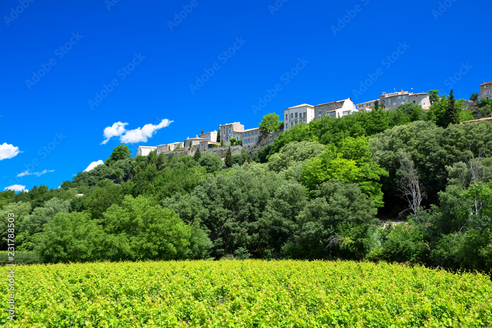 Panorama view of the hilltop medieval village of Menerbes in the Luberon region of Provence, France