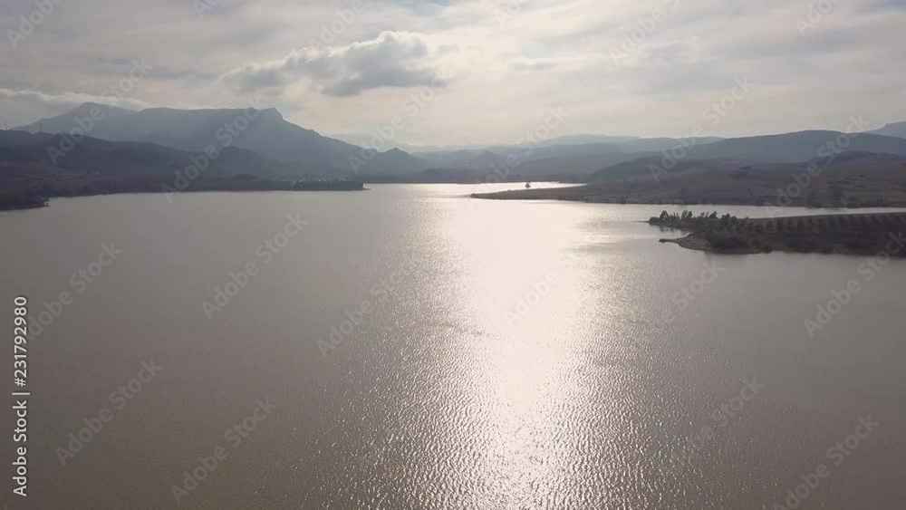 Beautiful aerial view over Ardales Lake at sunset , Malaga , Andalucia , Spain Beautiful aerial view over Ardales Lake at sunset , Malaga , Andalucia , Spain