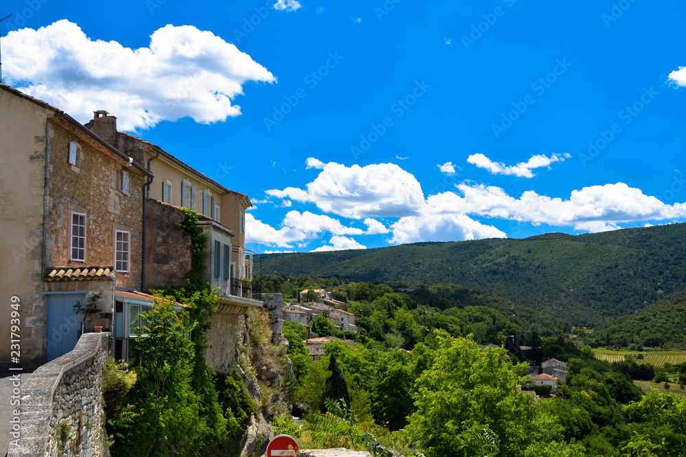 Views of the houses and architecture of the medieval village of Menerbes in the Luberon area of Provence, France
