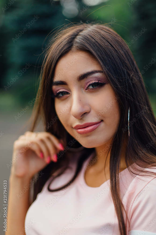 Portrait of a young attractive middle eastern woman with long hair Portrait of a young attractive middle eastern woman with long hair