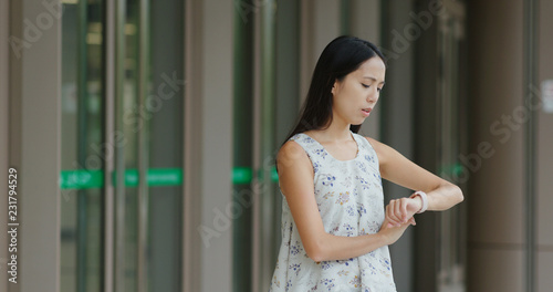 Woman use of mobile phone out of the station Free Download Woman use of mobile phone out of the station - GFXLoad