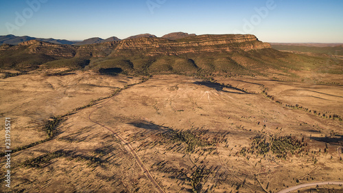 Aerial landscape view in the late afternoon of the Southern Escarpment of Wilpena Pound in the Flinders Ranges, South Australia. photo