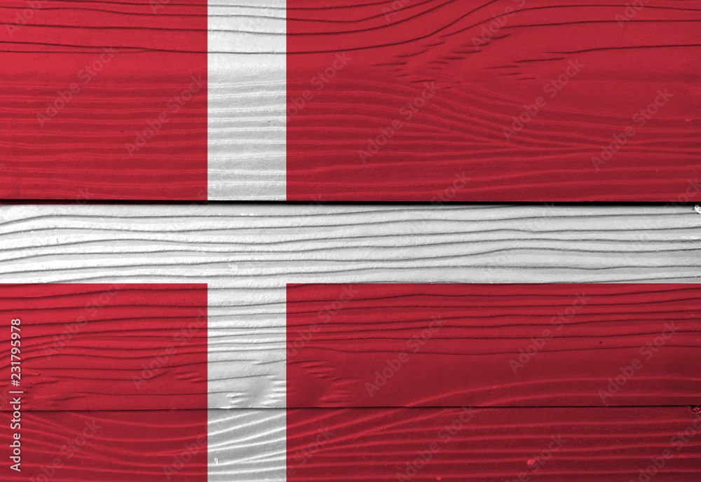 Flag of Denmark on wooden wall background. Grunge Denmark flag texture, red with a white Scandinavian cross. Flag of Denmark on wooden wall background. Grunge Denmark flag texture, red with a white Scandinavian cross.