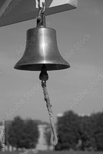 hanging copper bell with rope © Sergey