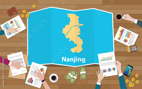 nanjing china province city region economy growth with team discuss on fold maps view from top