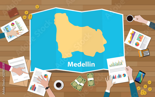 medellin colombia municiaplity city region economy growth with team discuss on fold maps view from top