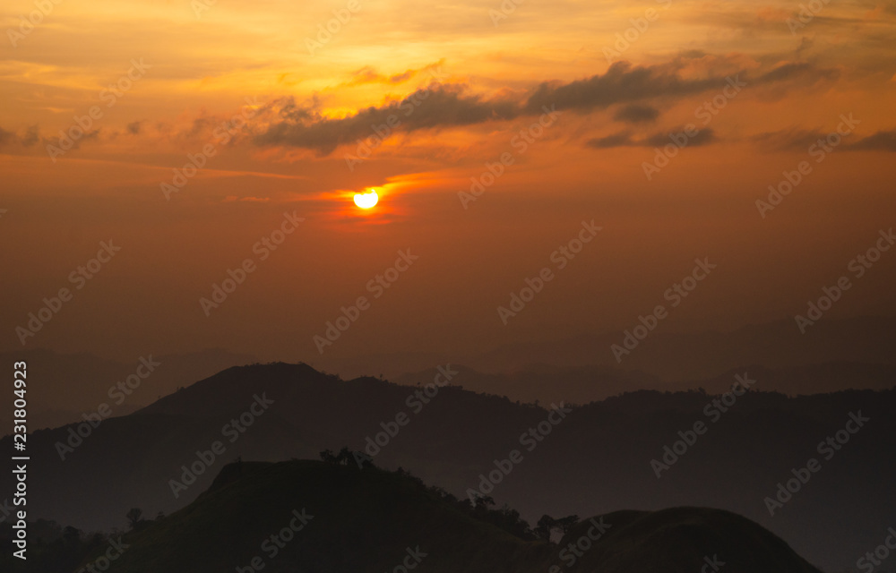 Beautiful landscape of Sunrise with mist, sky and cloud from top mountain in Sunrise at Thailand