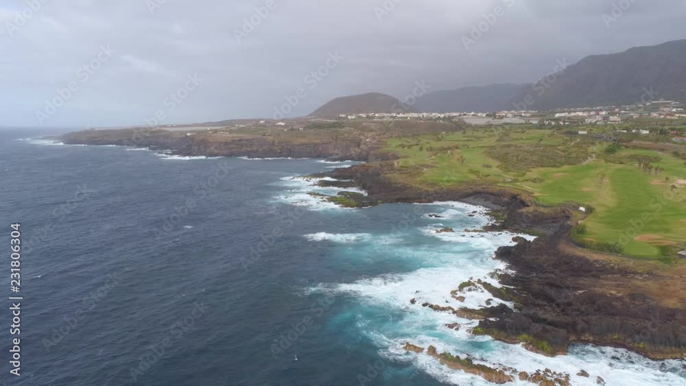 Aerial view of cliffs and Atlantic ocean on Tenerife, drone shot from above, Canarias islands, Spain Aerial view of cliffs and Atlantic ocean on Tenerife, drone shot from above, Canarias islands, Spain