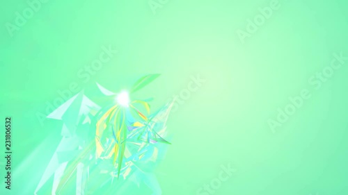 An abstract 3d rendering of polygonal and shining triangles spinning around like enigmatic creatures in the light green background. They create the mood of art in seamless loop. photo