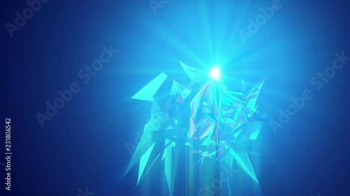 A futuristic 3d rendering of shining see-through triangles spinning around like alive crystals in the light blue background. They generate the mood of high art in seamless loop. photo