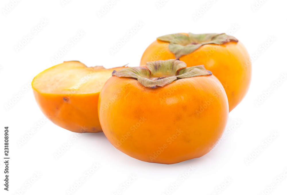 Tropical fruit persimmon. Kaki with leaves on white background.
