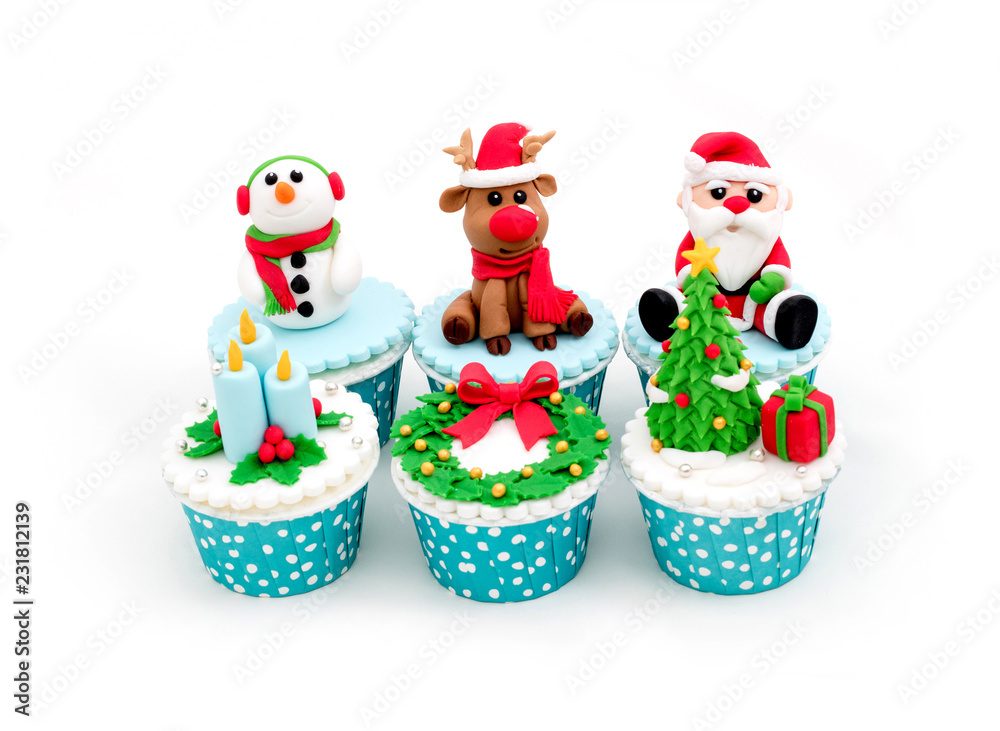 Fototapeta premium Christmas homemade cupcakes isolated on white background
