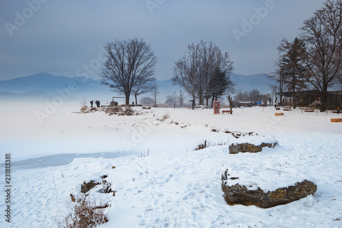 The white snow falls down to the beautiful Dumulmeori of Yangpyeong. photo