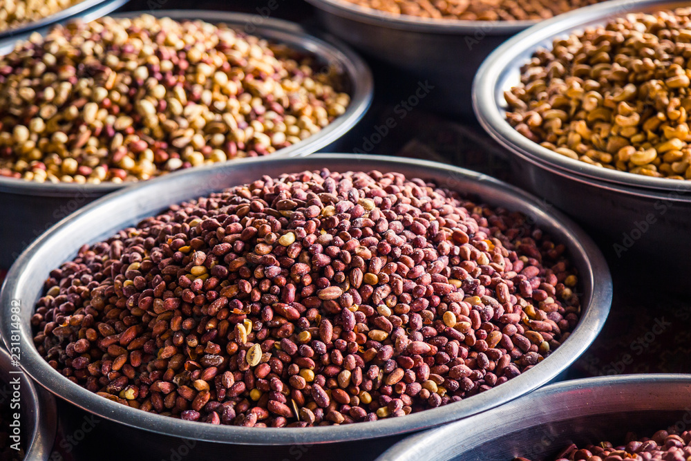 A mixture of nuts on the market. Various nuts in the store, juicy snacks sold in the market. Food for vegetarians. Ingredient for cooking and sweets. A mixture of nuts on the market. Various nuts in the store, juicy snacks sold in the market. Food for vegetarians. Ingredient for cooking and sweets.