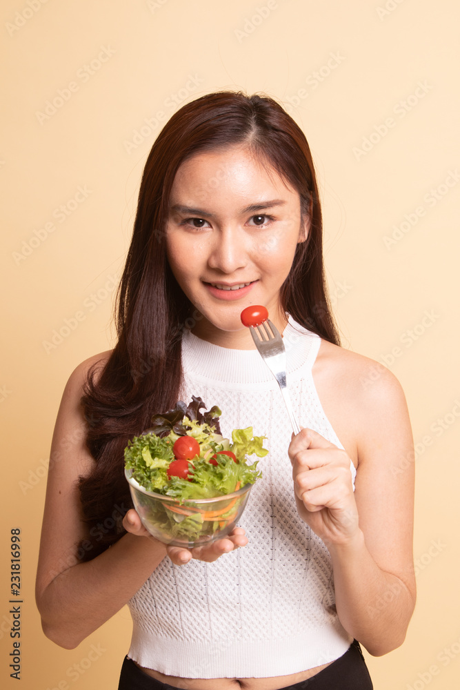 Healthy Asian woman with salad. Healthy Asian woman with salad.