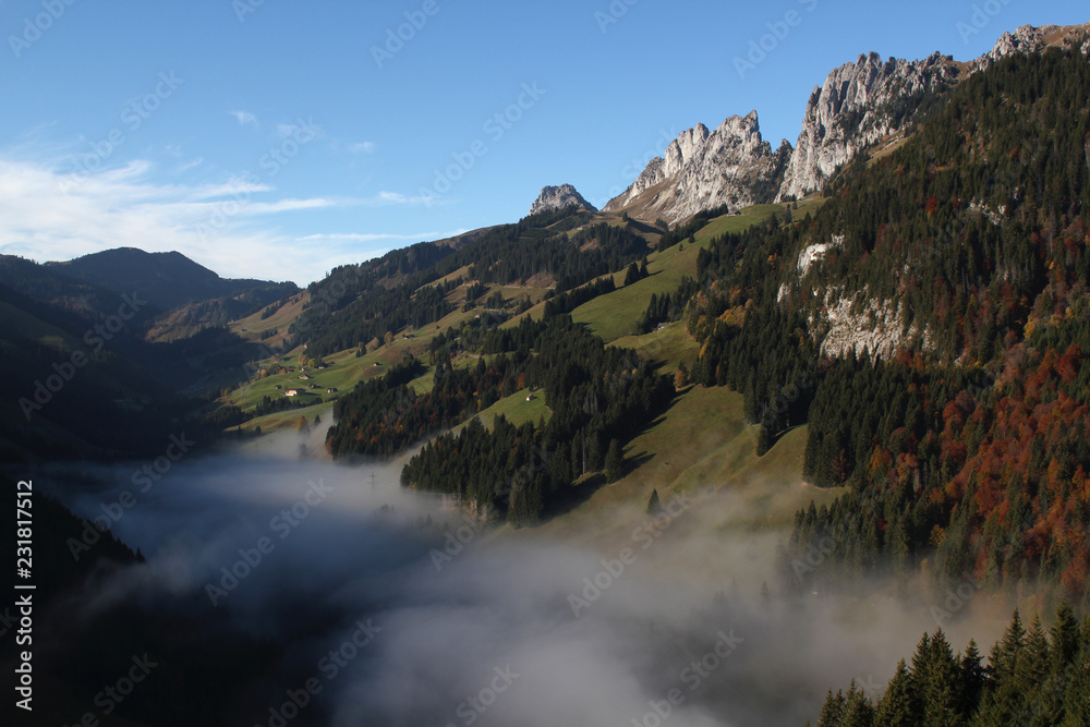 Fog in the valley at Jaunpass with Rudigenspitze on the right. Fog in the valley at Jaunpass with Rudigenspitze on the right.