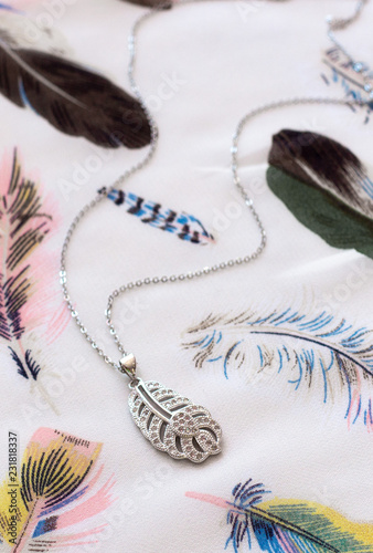 Feather shaped pendant