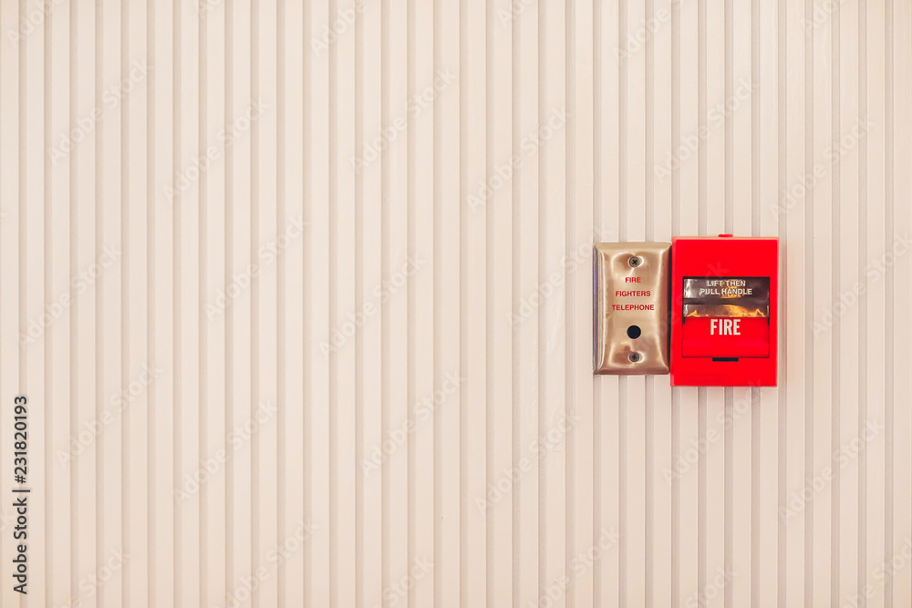 fire alarm system box installed on wall in modern building. fire alarm system box installed on wall in modern building.