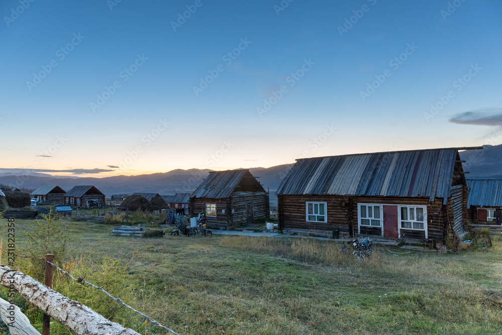 Fototapeta premium xinjiang log cabin in nightfall