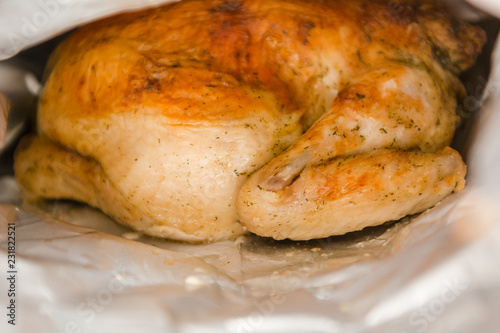 Fried chicken lies on a plate. Fried chicken with spices.