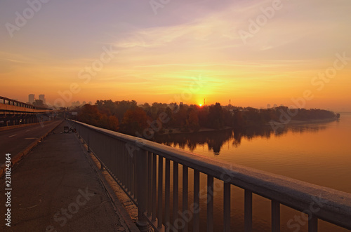 Wallpaper Mural Wide angle landscape panorama of Dnipro River. Magnificent autumn sunrise in Kyiv. Foggy morning landscape. Beautiful city view with rising sun and fiery sky. Kyiv (Kiev), Ukraine Torontodigital.ca