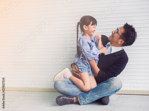 happy family with father and child playing together