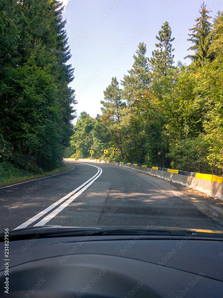 Fototapeta premium View to the road through the windshield 