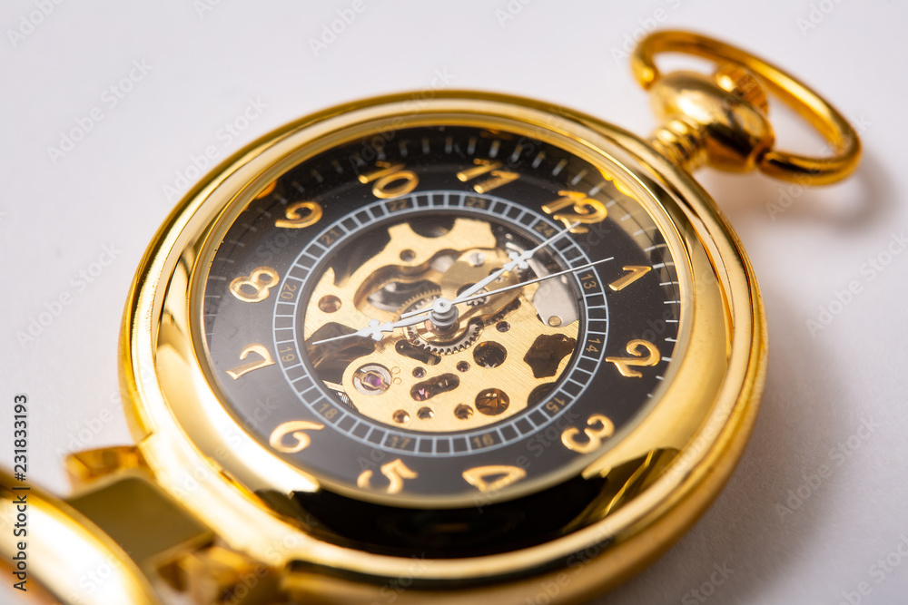a classic gold pocket watch