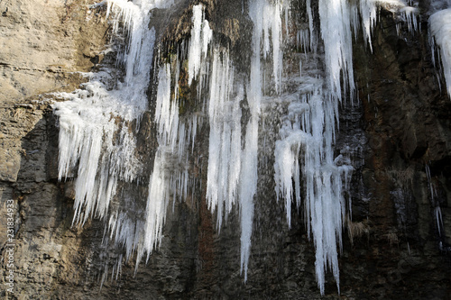 Beautiful frozen waterfall in Kamianets-Podilskyi city, western Ukraine