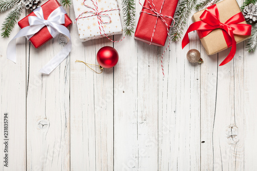 Christmas decoration and gift boxes on wooden background