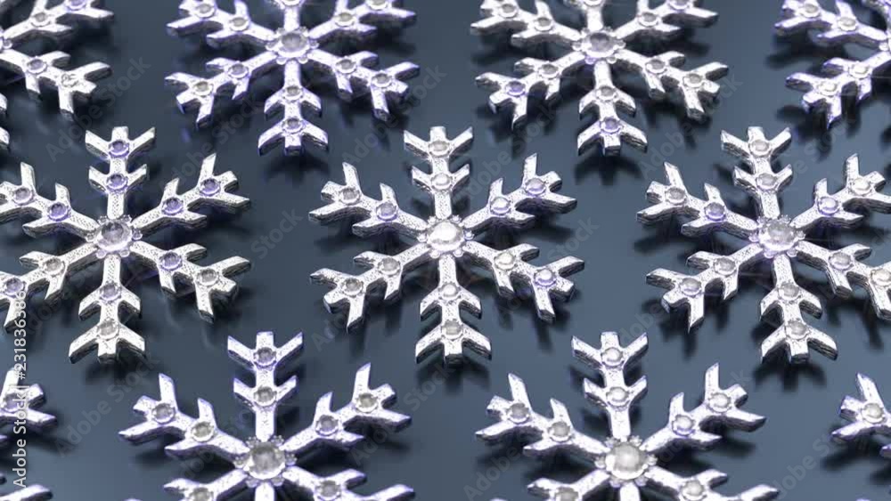 Shiny snowflakes jewels rotating on blue glossy surface, loopable animation Shiny snowflakes jewels rotating on blue glossy surface, loopable animation