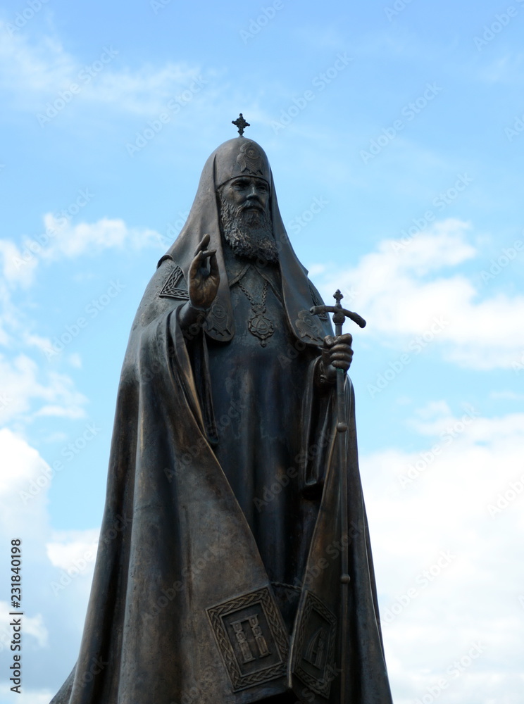 Fototapeta premium Monument to Patriarch Alexy II near the Holy Dormition Cathedral in Vitebsk
